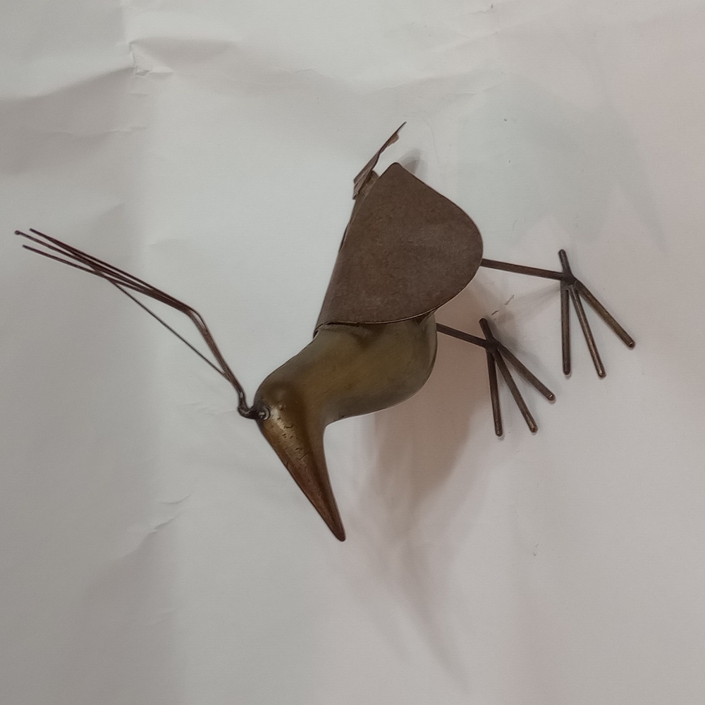 Metal bird sculpture